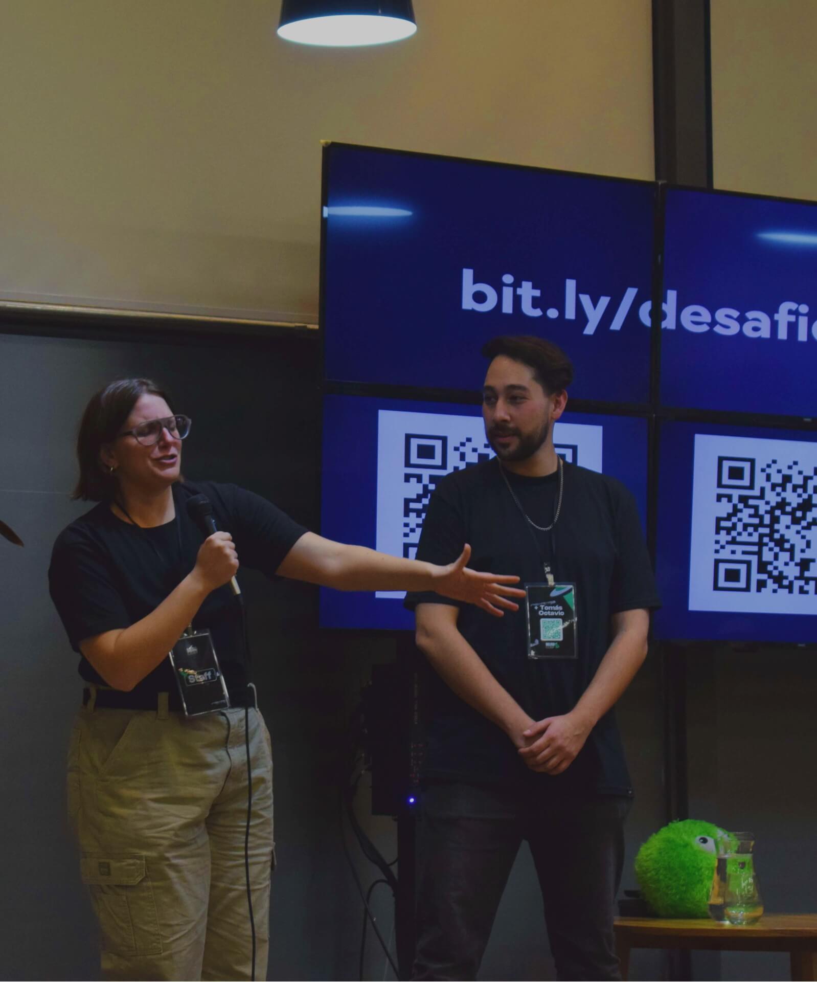 Founders on stage at NerdConf speaking to an audience