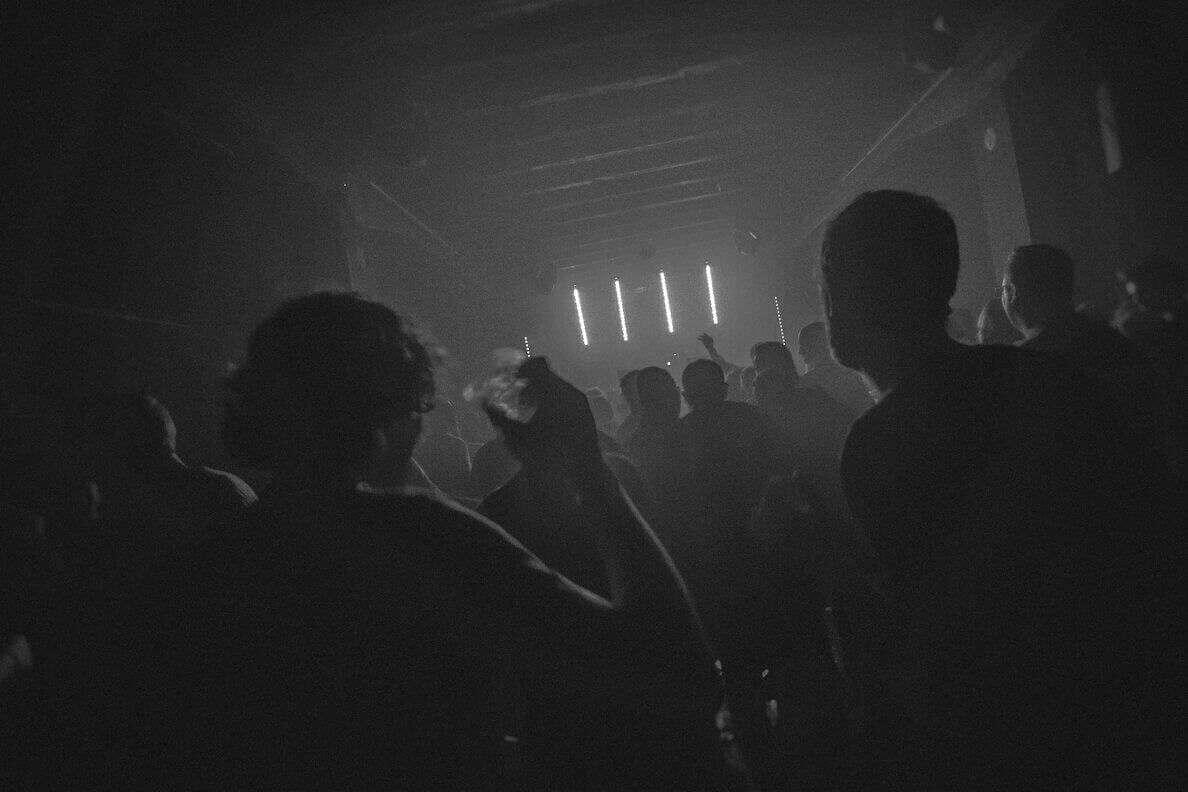 NerdConf after party with neon lights and electronic music